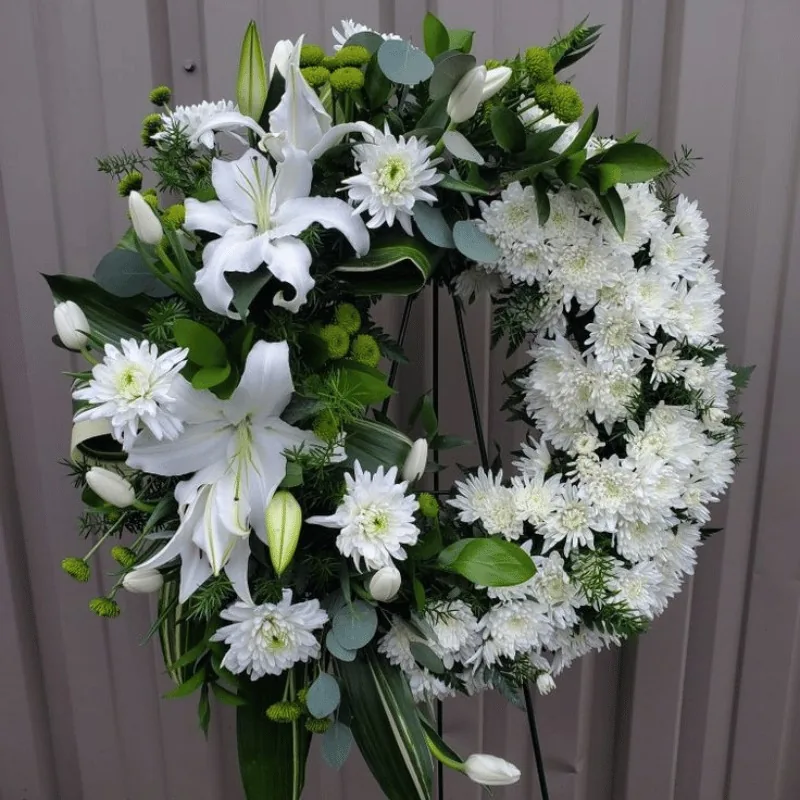 Krans Bulet Duka Cita 850rb bunga lily putih dan krisan - Florist Jakarta same day delivery